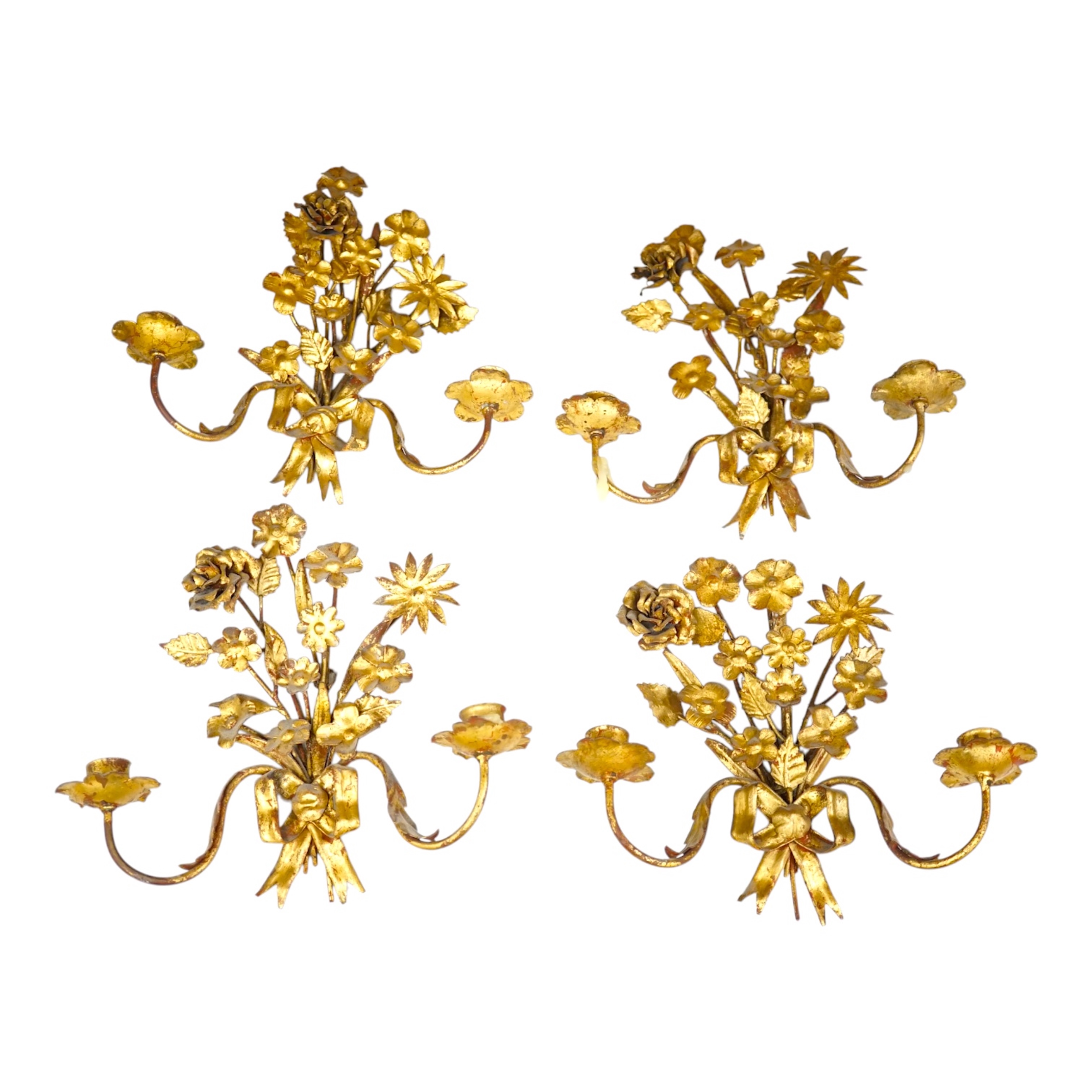 A set of four gilt metal two branch wall sconces, largest 26cm high. Condition - fair